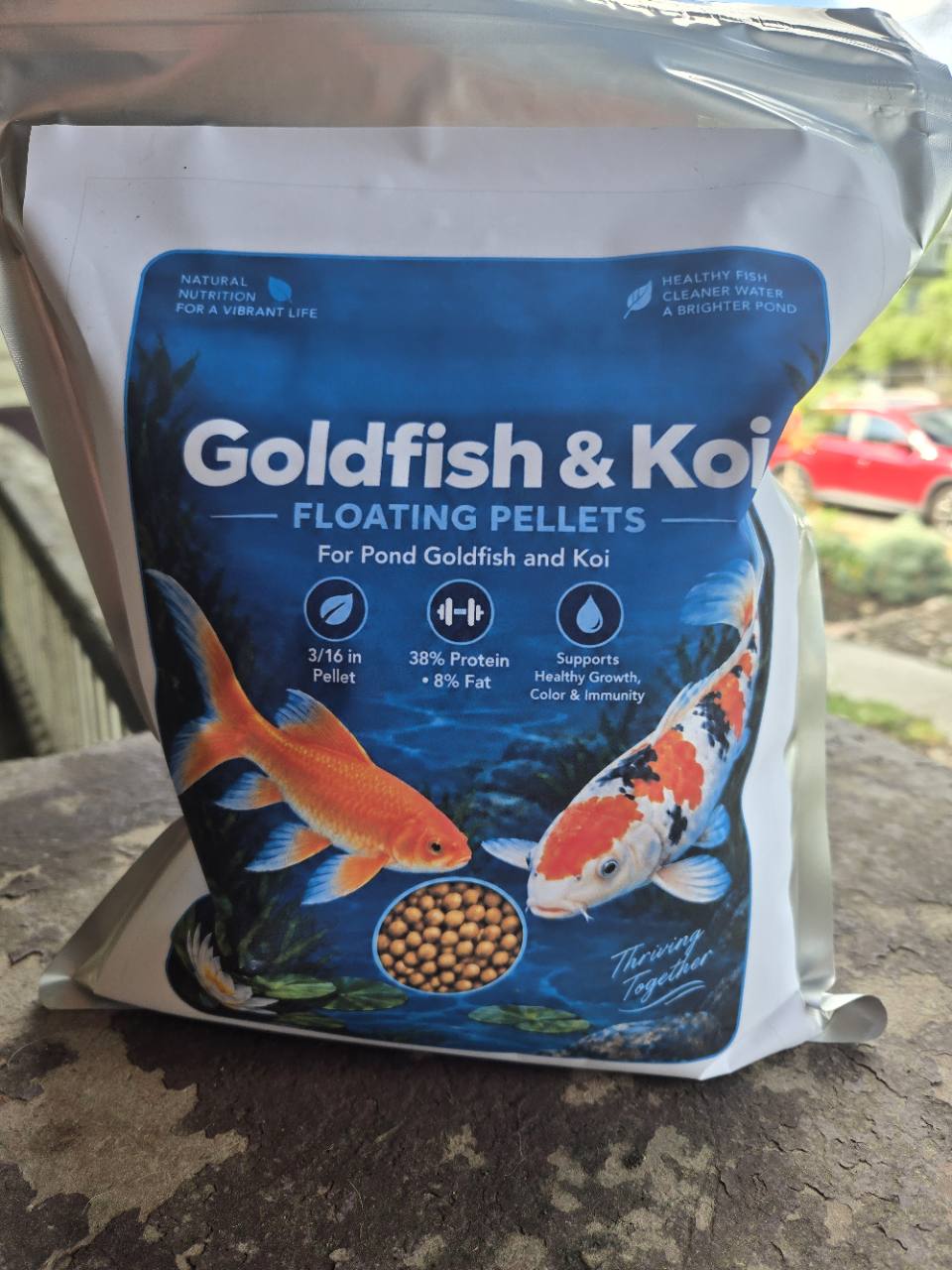 Front of FinNaturals Goldfish and Koi Formula bag showing 38% protein and 8% fat.