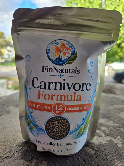 Actual FinNaturals Carnivore Smaller Bites Formula 1.2 mm silver pouch photographed outdoors, front label.
