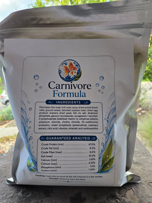 Actual Carnivore Formula 2.5 mm pouch photographed outdoors, back label with ingredients and guaranteed analysis.