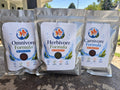Actual FinNaturals 2.5 mm sampler: one 8 oz silver pouch each of Omnivore, Herbivore, and Carnivore Formula; three bags total.