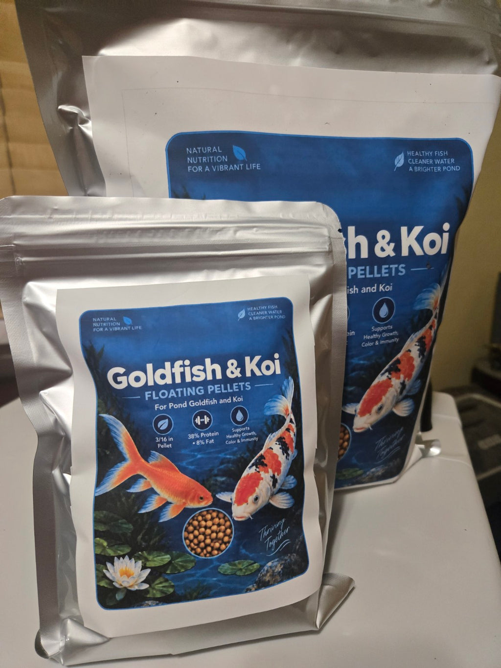 Actual FinNaturals Goldfish and Koi Formula silver packaging. Select the bag weight in the size options.