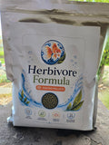 Actual FinNaturals Herbivore Formula 2.5 mm silver pouch photographed outdoors, front label.